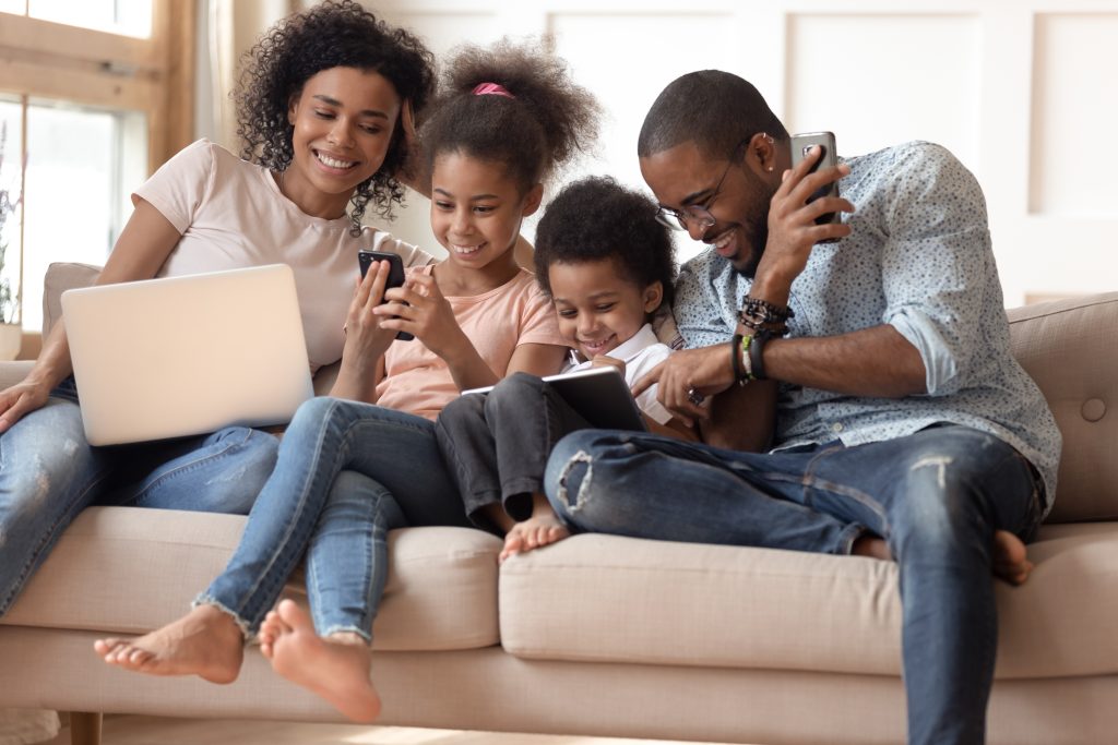 Casual family browsing online at home using Telem Smart WiFi connection